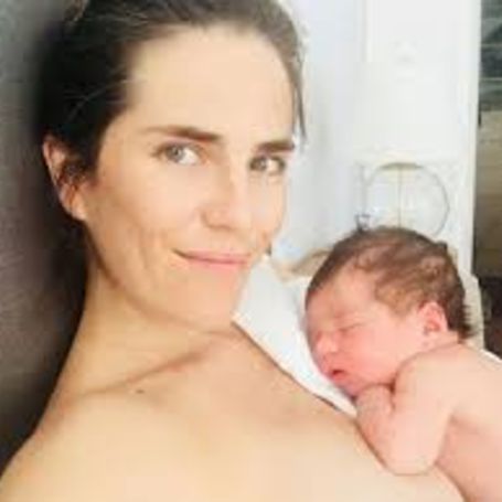 Karla Souza with her child